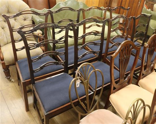 A set of eight George III style ladderback dining chairs